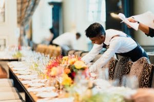 Catering Reps Preparing a Table for an Event